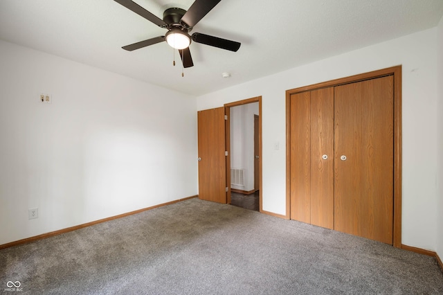 6715 Wandering Way, Indianapolis, IN 46241 - unfurnished bedroom with carpet flooring, baseboards, a closet, and a ceiling fan