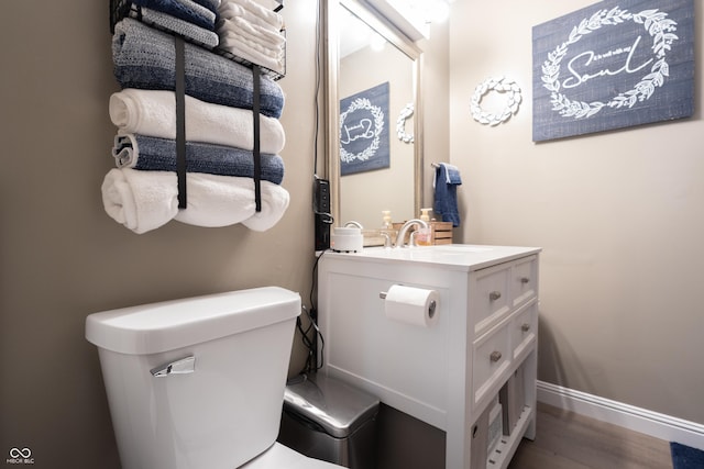 6310 E County Road 200 S, Butlerville, IN 47223 - half bathroom with vanity and wood finished floors