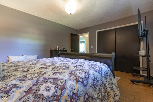 6310 E County Road 200 S, Butlerville, IN 47223 - bedroom featuring wood finished floors and a closet