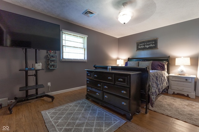 6310 E County Road 200 S, Butlerville, IN 47223 - bedroom with wood finished floors and baseboards