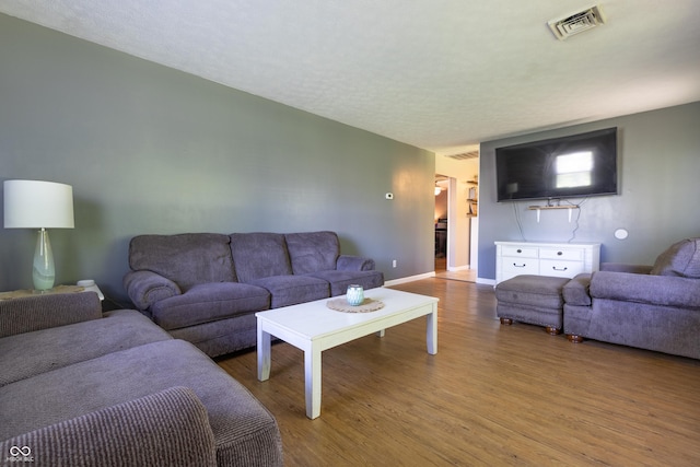 6310 E County Road 200 S, Butlerville, IN 47223 - living room featuring wood finished floors and baseboards