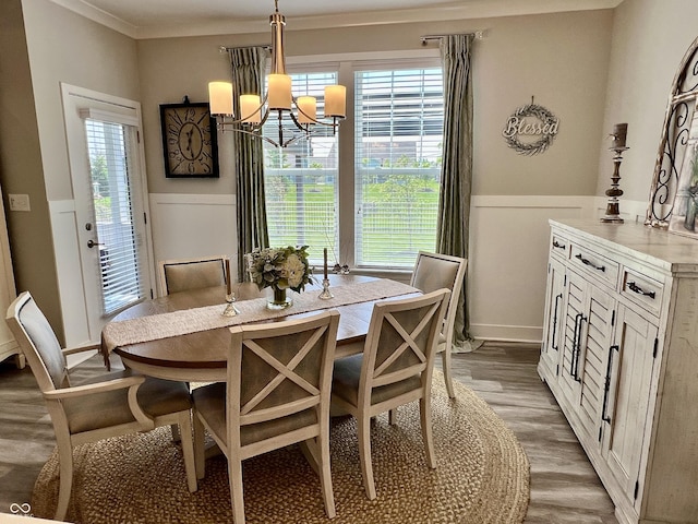 3691 Talmine Ln, Bargersville, IN 46106 - dining room with a chandelier, wainscoting, wood finished floors, and crown molding
