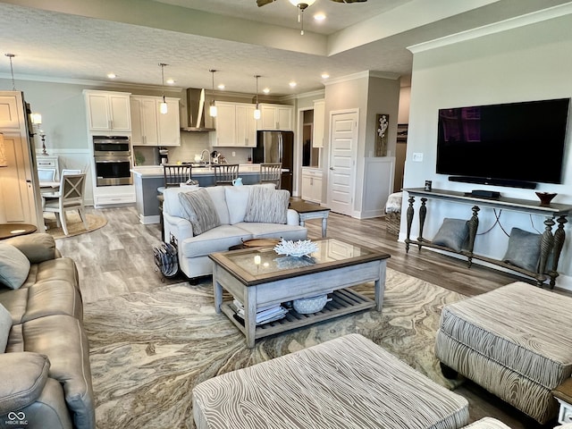 3691 Talmine Ln, Bargersville, IN 46106 - living area with crown molding, light wood-style flooring, recessed lighting, a ceiling fan, and baseboards