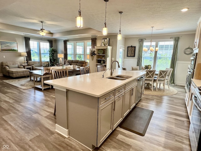 3691 Talmine Ln, Bargersville, IN 46106 - kitchen with a sink, light wood-style floors, dishwasher, healthy amount of natural light, and a textured ceiling