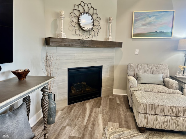 3691 Talmine Ln, Bargersville, IN 46106 - living room with wood finished floors, baseboards, and a tile fireplace