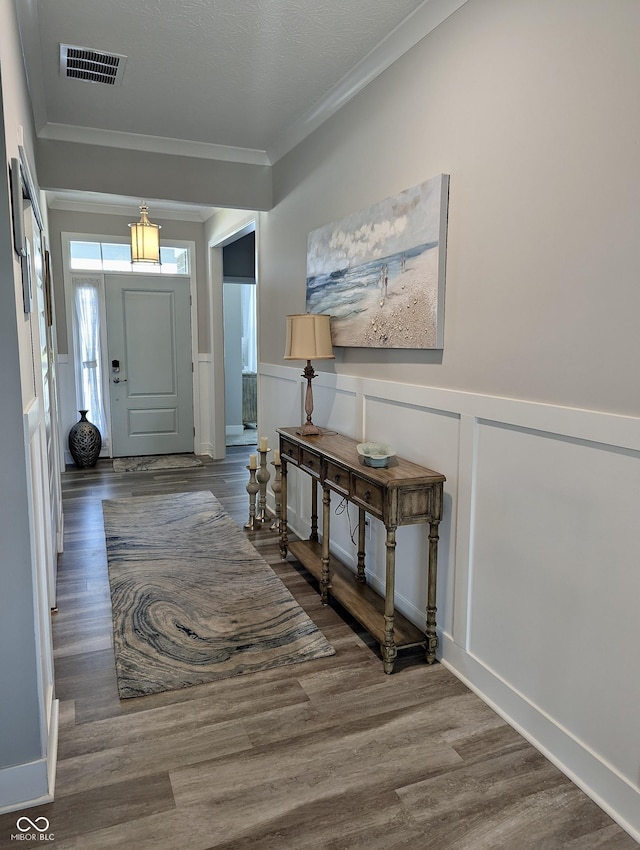 3691 Talmine Ln, Bargersville, IN 46106 - foyer entrance featuring ornamental molding, wood finished floors, wainscoting, and a decorative wall