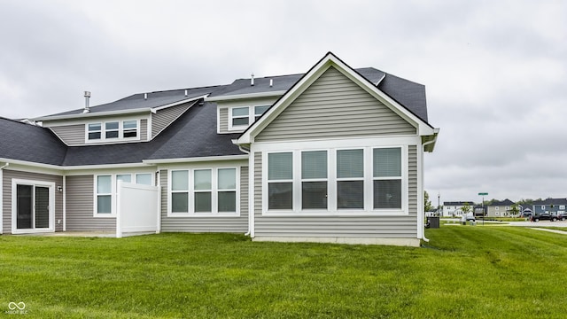 747 Tuxedo Dr, Westfield, IN 46074 - rear view of house with a yard and a shingled roof