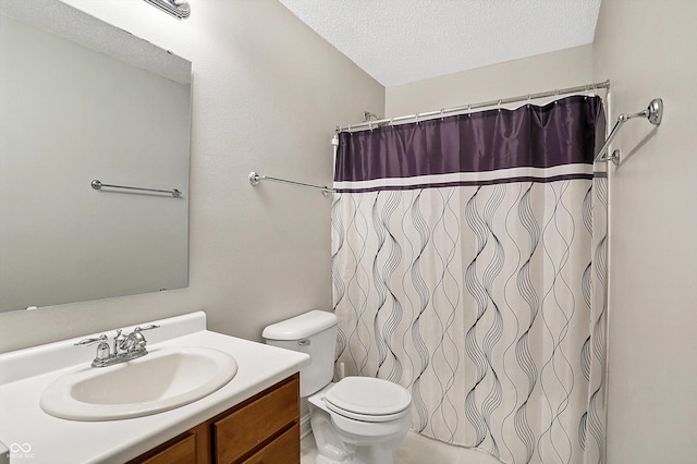 full bathroom featuring vanity, a textured ceiling, toilet, and a shower with shower curtain