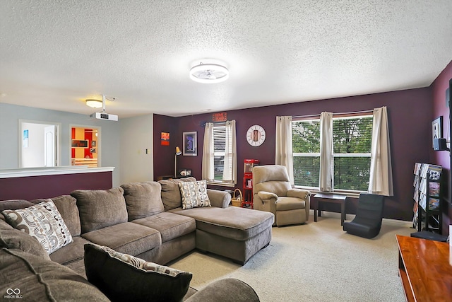 living room with light colored carpet and a textured ceiling