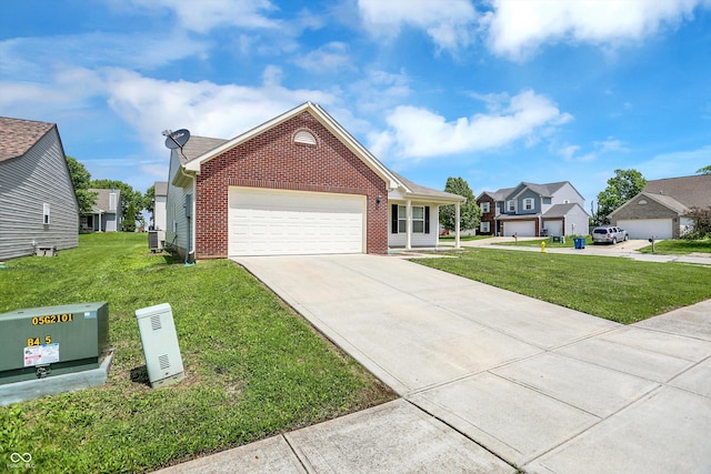 3222 Enclave Ln, Greenwood, IN 46143 - view of front of home with brick siding, a front lawn, an attached garage, driveway, and central AC