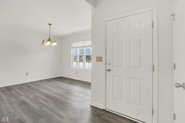 3222 Enclave Ln, Greenwood, IN 46143 - entrance foyer with a chandelier, baseboards, and dark wood-style floors