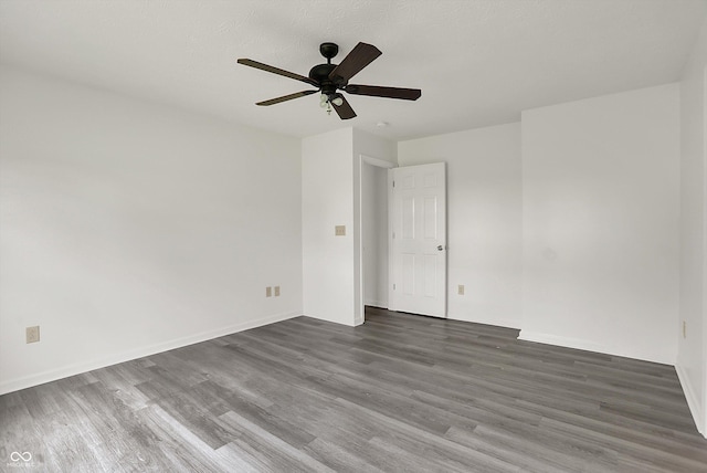 3222 Enclave Ln, Greenwood, IN 46143 - unfurnished room with wood finished floors, ceiling fan, and baseboards