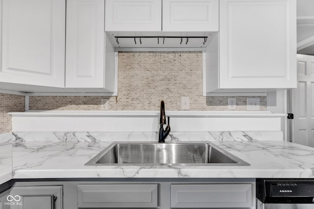 1237 W State Rd 38, Pendleton, IN 46064 - kitchen featuring a sink, white cabinetry, dishwasher, backsplash, and light stone countertops