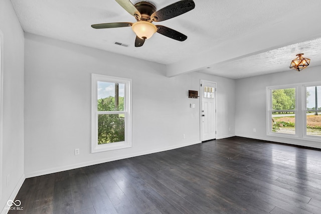 1237 W State Rd 38, Pendleton, IN 46064 - empty room featuring baseboards, dark wood-style flooring, ceiling fan, and a textured ceiling