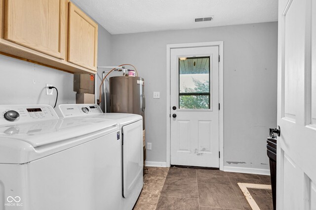 1237 W State Rd 38, Pendleton, IN 46064 - clothes washing area with cabinet space, washer and clothes dryer, baseboards, and electric water heater