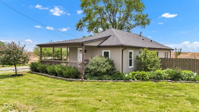 1237 W State Rd 38, Pendleton, IN 46064 - view of side of home featuring a shingled roof and covered porch