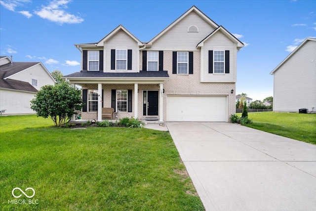 traditional-style house with covered porch, an attached garage, driveway, a front yard, and brick siding