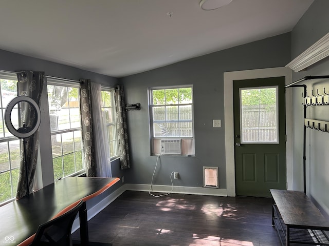 404 Pearl St, Pendleton, IN 46064 - foyer entrance featuring vaulted ceiling, plenty of natural light, wood finished floors, and baseboards