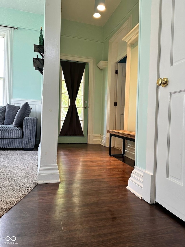 404 Pearl St, Pendleton, IN 46064 - corridor featuring healthy amount of natural light and wood finished floors