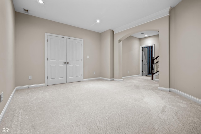 4368 W Eagle Trce, New Palestine, IN 46163 - unfurnished bedroom with arched walkways, light colored carpet, recessed lighting, baseboards, and a closet