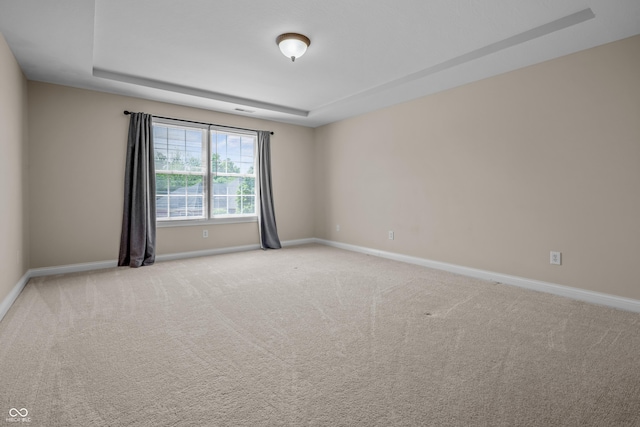 4368 W Eagle Trce, New Palestine, IN 46163 - carpeted empty room featuring baseboards and a tray ceiling