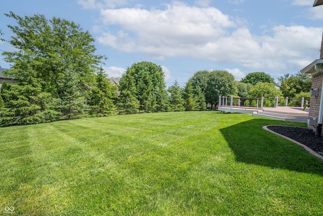 4368 W Eagle Trce, New Palestine, IN 46163 - view of grassy yard featuring a wooden deck