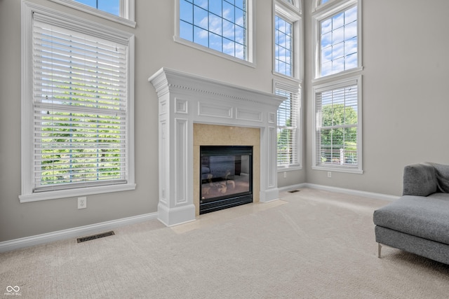 4368 W Eagle Trce, New Palestine, IN 46163 - living area with carpet flooring, plenty of natural light, and a high ceiling