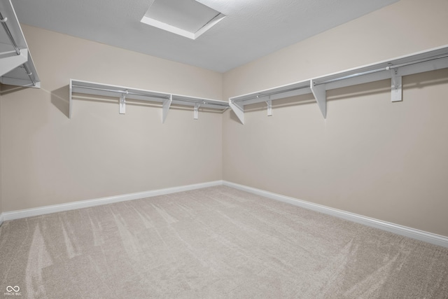 4368 W Eagle Trce, New Palestine, IN 46163 - walk in closet featuring carpet floors and attic access