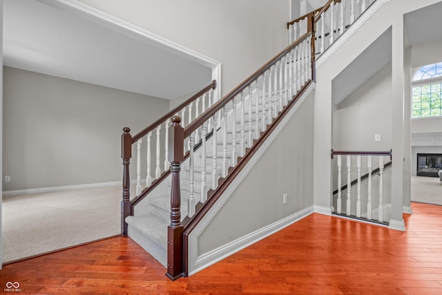 4368 W Eagle Trce, New Palestine, IN 46163 - staircase with wood finished floors and baseboards