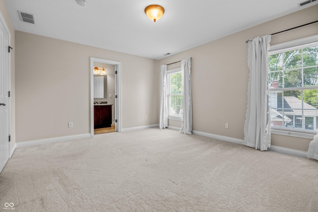 4368 W Eagle Trce, New Palestine, IN 46163 - unfurnished bedroom featuring baseboards, carpet flooring, and connected bathroom