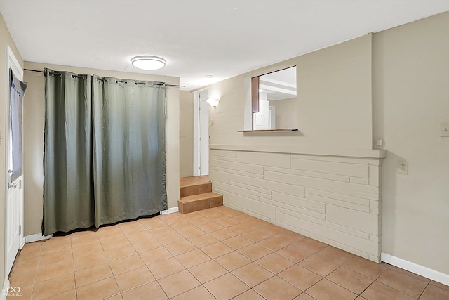 425 Aiken St, Hope, IN 47246 - unfurnished room featuring light tile patterned flooring and baseboards