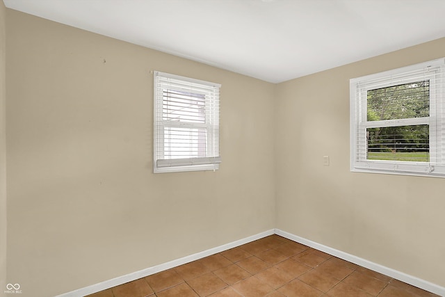 425 Aiken St, Hope, IN 47246 - unfurnished room featuring plenty of natural light and tile patterned floors