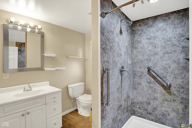 425 Aiken St, Hope, IN 47246 - bathroom with tile patterned floors, a shower, and vanity