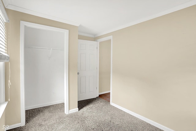 425 Aiken St, Hope, IN 47246 - unfurnished bedroom with light colored carpet, ornamental molding, and a closet