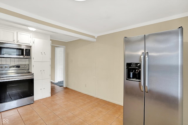 425 Aiken St, Hope, IN 47246 - kitchen with stainless steel appliances, white cabinets, and light tile patterned flooring