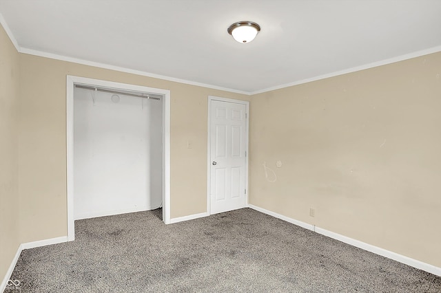 425 Aiken St, Hope, IN 47246 - unfurnished bedroom with carpet flooring, crown molding, and a closet