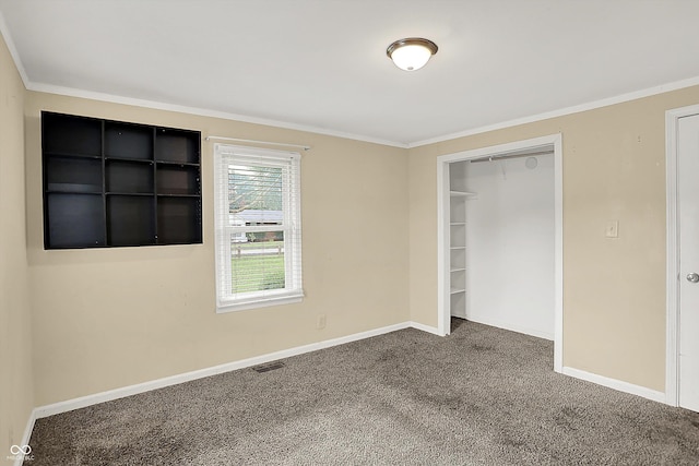 425 Aiken St, Hope, IN 47246 - unfurnished bedroom with carpet, crown molding, and a closet