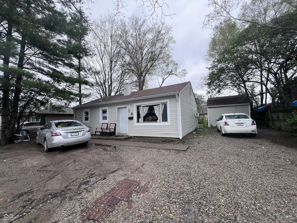 4020 Patricia St, Indianapolis, IN 46222 - view of front facade with a chimney