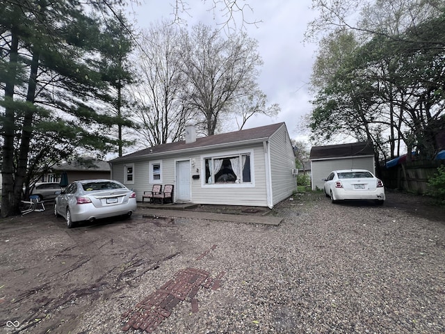 4020 Patricia St, Indianapolis, IN 46222 - view of front facade with a chimney