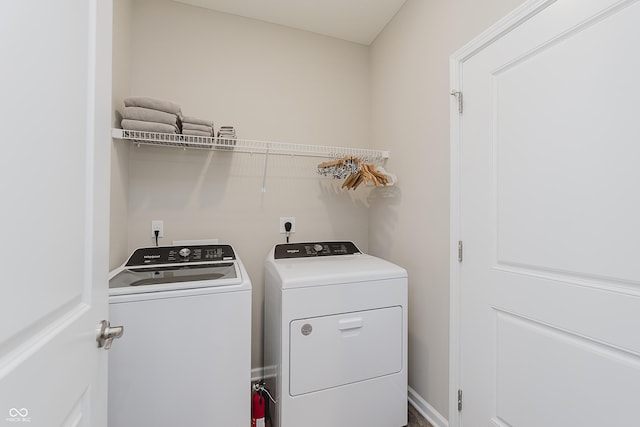6465 Wasco Dr, Whitestown, IN 46075 - clothes washing area featuring independent washer and dryer