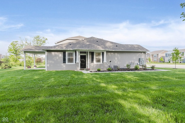 6465 Wasco Dr, Whitestown, IN 46075 - rear view of property with central air condition unit, a lawn, and roof with shingles