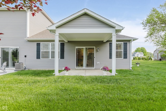 6465 Wasco Dr, Whitestown, IN 46075 - rear view of property featuring a patio, a lawn, and central air condition unit
