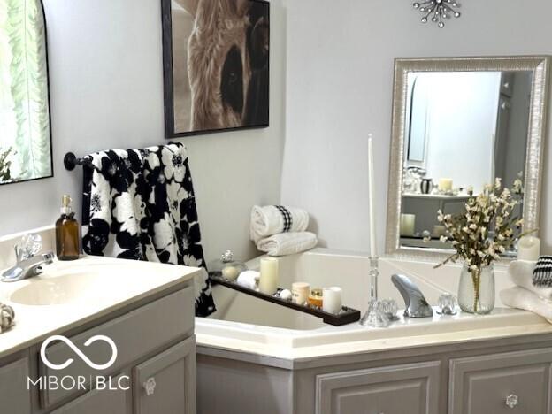4600 S Tahoe Trl, Crawfordsville, IN 47933 - bathroom featuring vanity and a garden tub