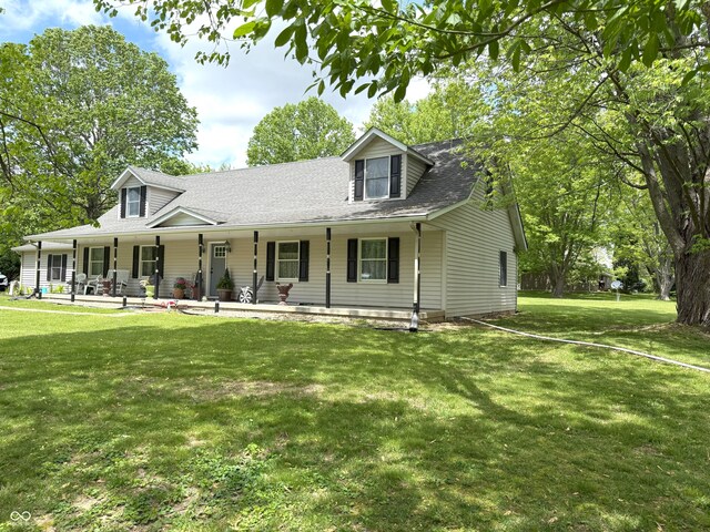 4600 S Tahoe Trl, Crawfordsville, IN 47933 - view of front of property with a front yard, covered porch, and a shingled roof