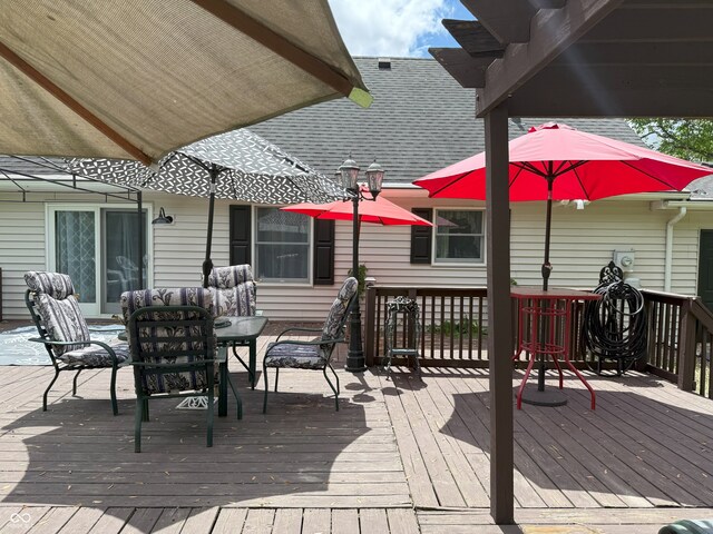 4600 S Tahoe Trl, Crawfordsville, IN 47933 - wooden deck with outdoor dining space