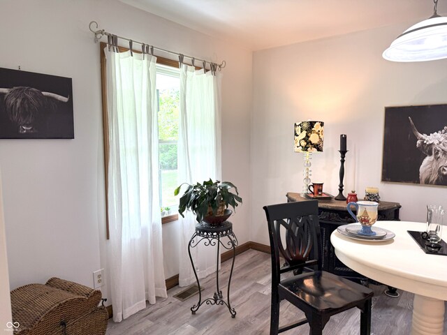 4600 S Tahoe Trl, Crawfordsville, IN 47933 - dining area featuring light wood-type flooring and baseboards