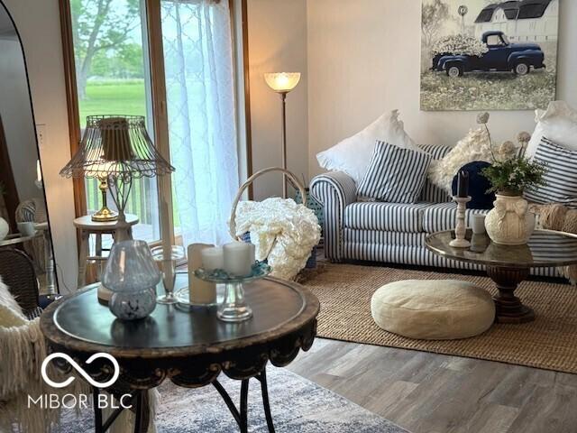 4600 S Tahoe Trl, Crawfordsville, IN 47933 - sitting room with wood finished floors and healthy amount of natural light