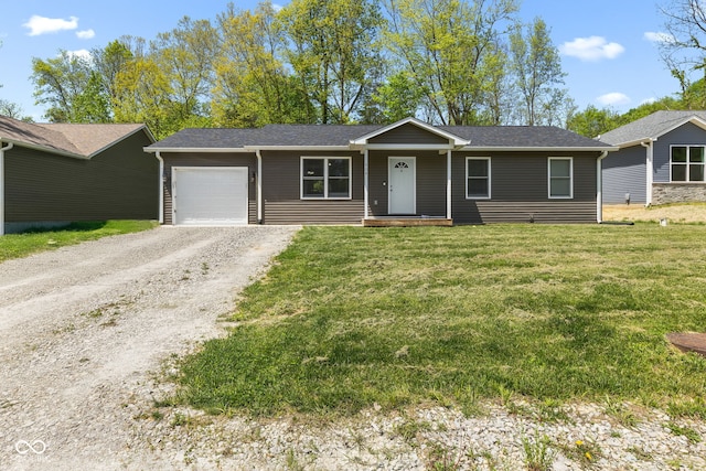 508 Jefferson, Coatesville, IN 46121 - ranch-style home featuring an attached garage, driveway, and a front lawn