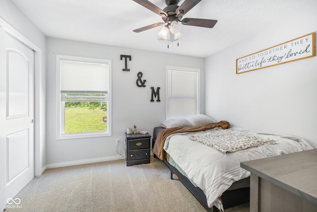 508 Jefferson, Coatesville, IN 46121 - bedroom featuring light colored carpet, baseboards, and ceiling fan