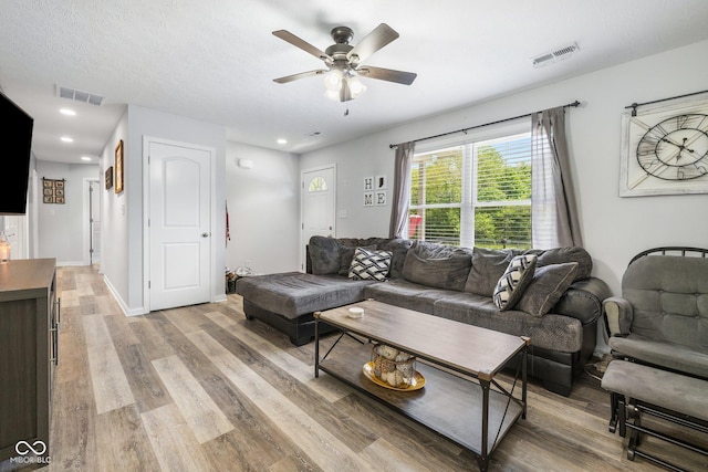508 Jefferson, Coatesville, IN 46121 - living room with a ceiling fan, light wood-style floors, recessed lighting, and baseboards